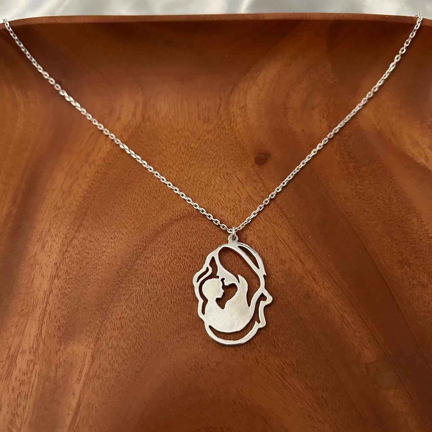 Mother Kissing Kid Necklace in 92.5 Sterling Silver