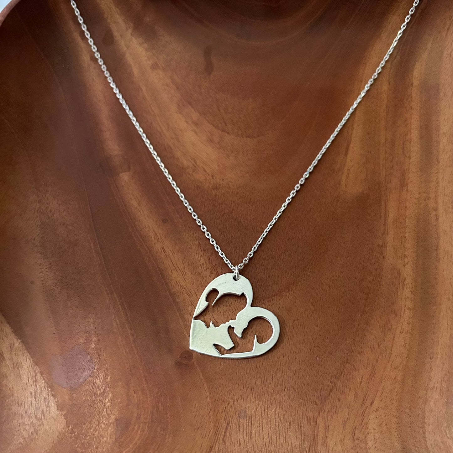 Mother holding kid with love Necklace in 925 Sterling Silver