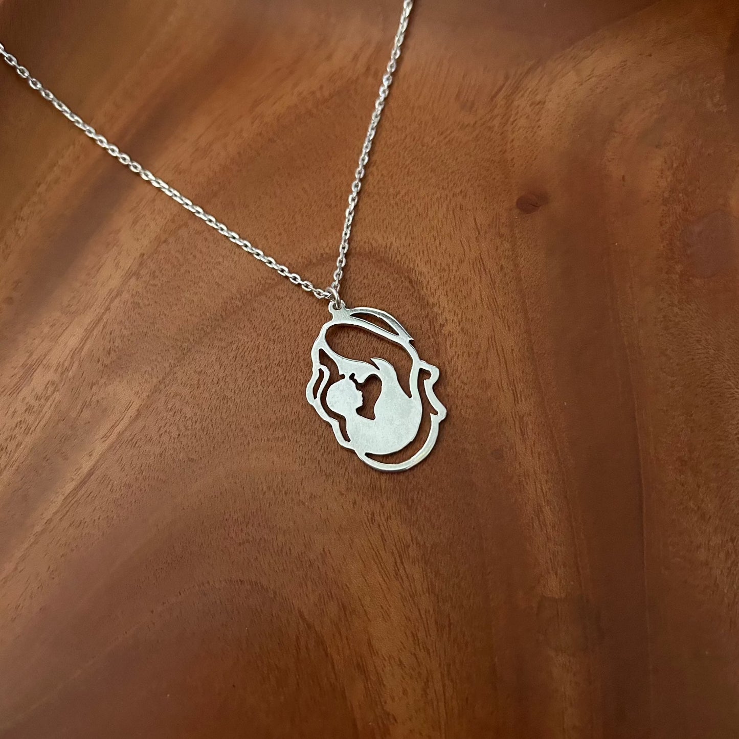 Mother Kissing Kid Necklace in 92.5 Sterling Silver