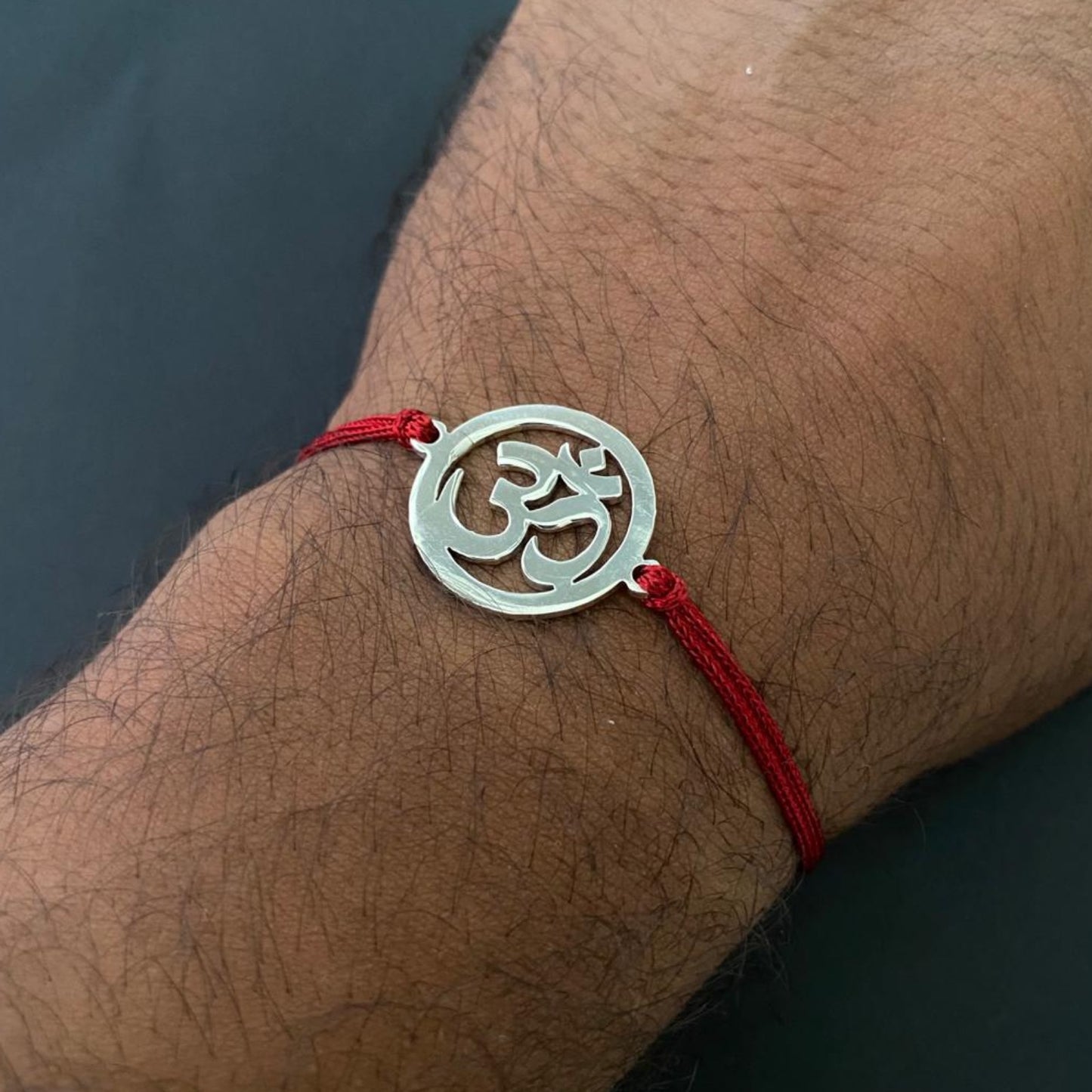 Om rakhi in 925 Sterling Silver