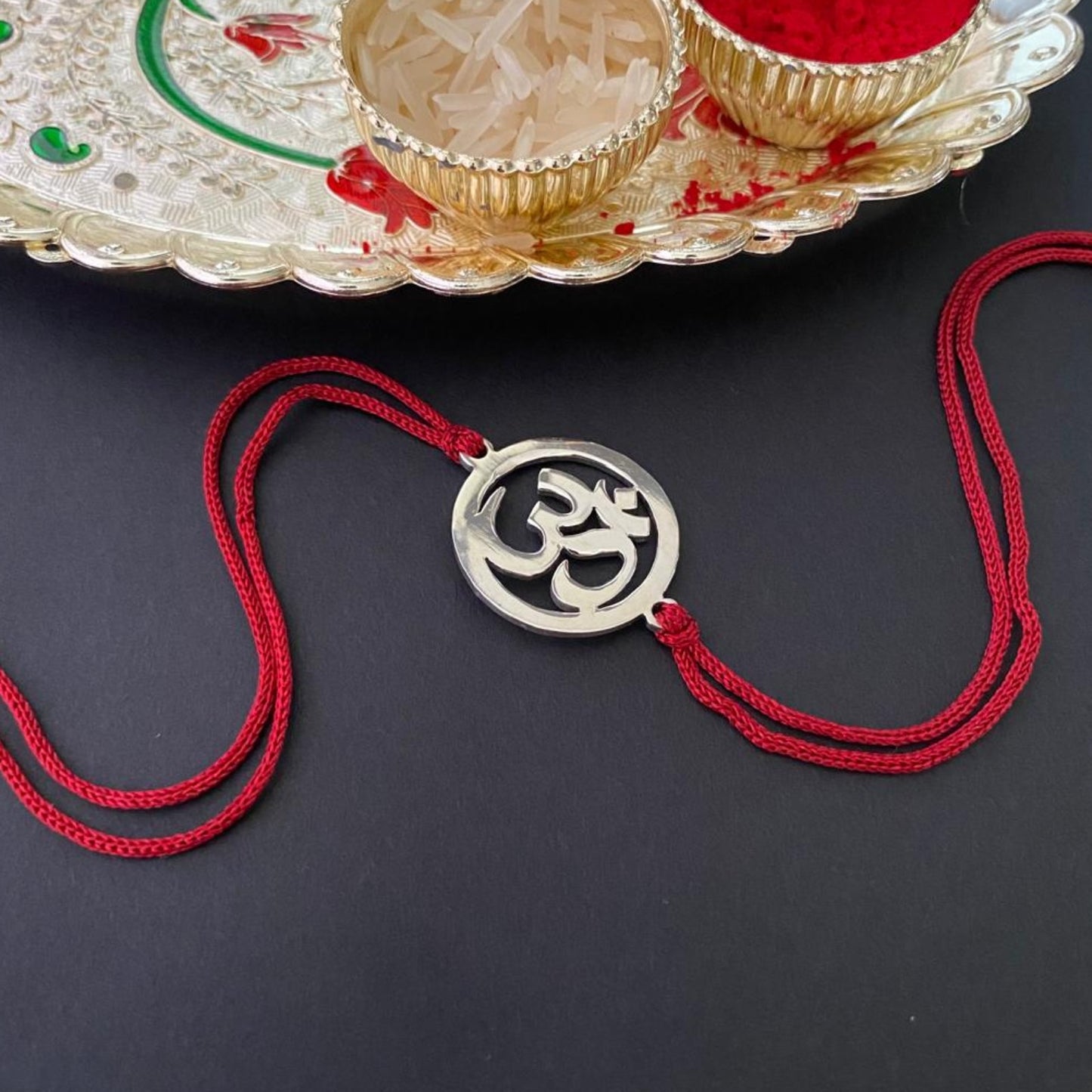 Om rakhi in 925 Sterling Silver